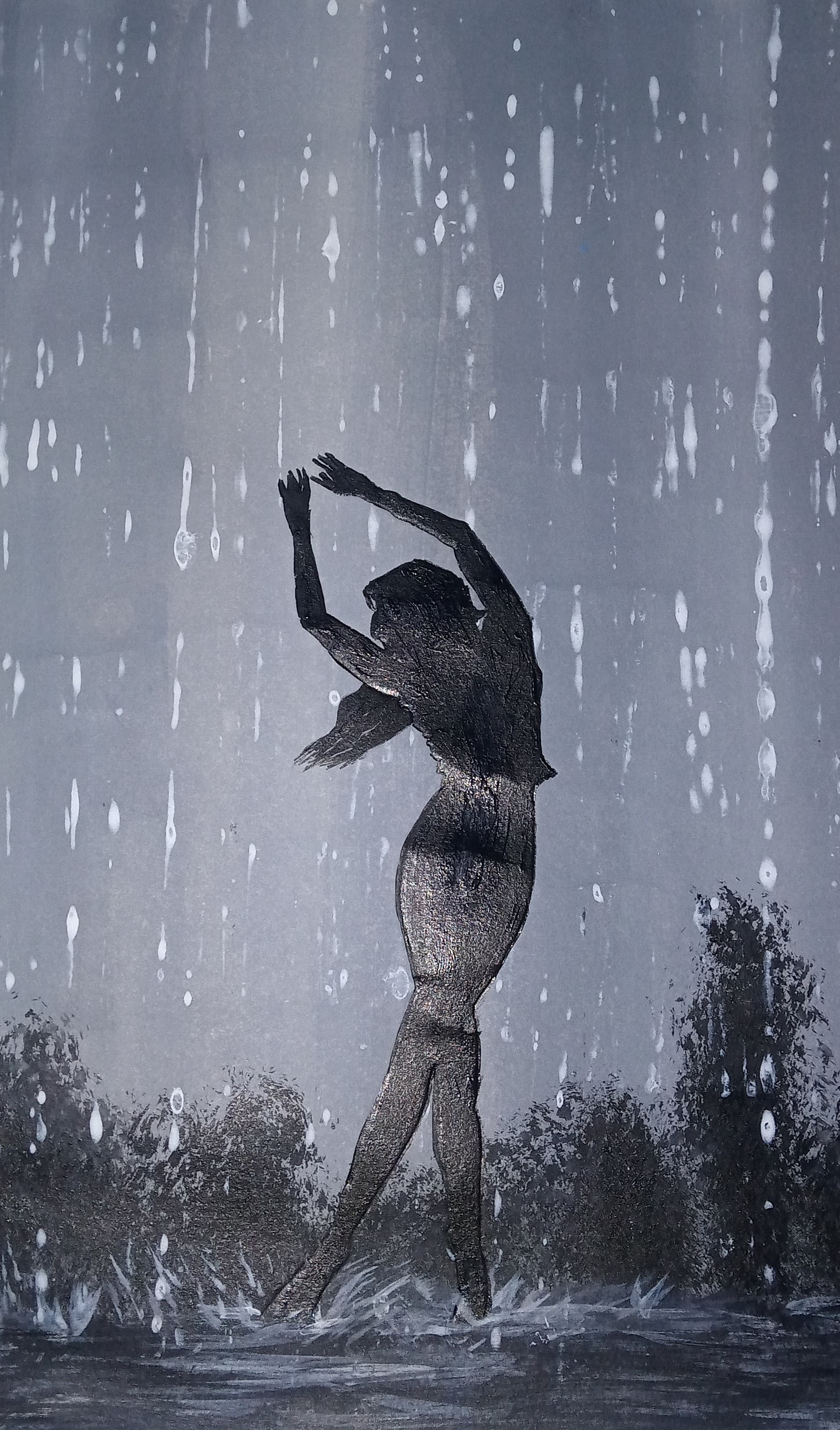 Silhouette of woman dancing in the rain